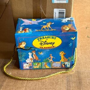 Books and music box that holds them